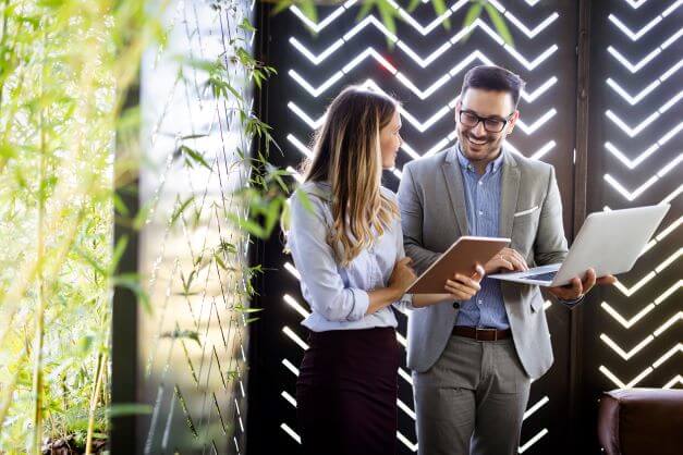 Suited and recruited: how your business can make a good impression on job applicants 1 showing new employee around