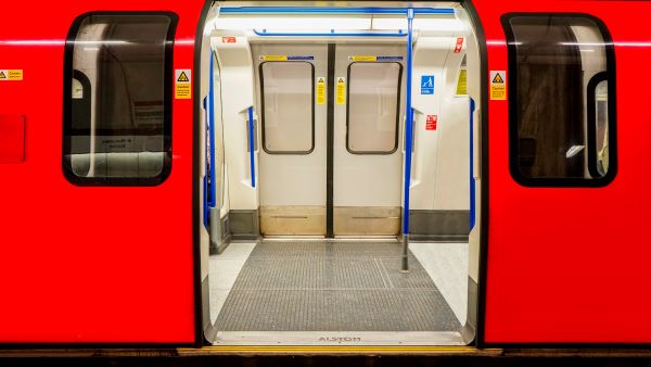 Beneath the Bustling City: Exploring The London Underground 1 A tube train with doors open