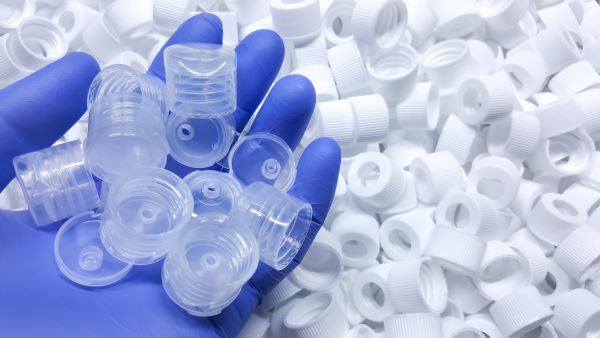 The Business Benefits of Plastic Injection Moulding 1 A handful of plastic bottle tops