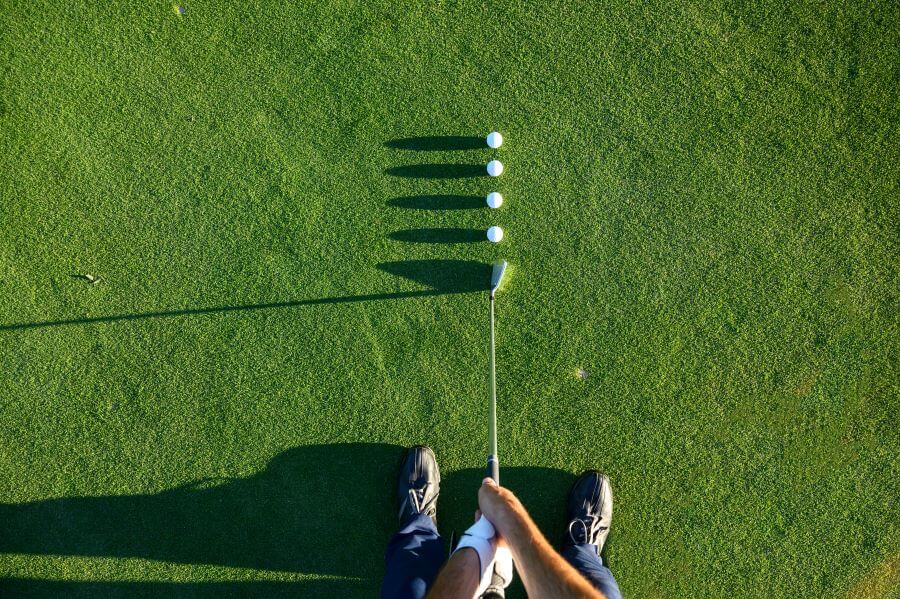 Tee off With Confidence: Everything You Need to Play Golf 4 practicing putting