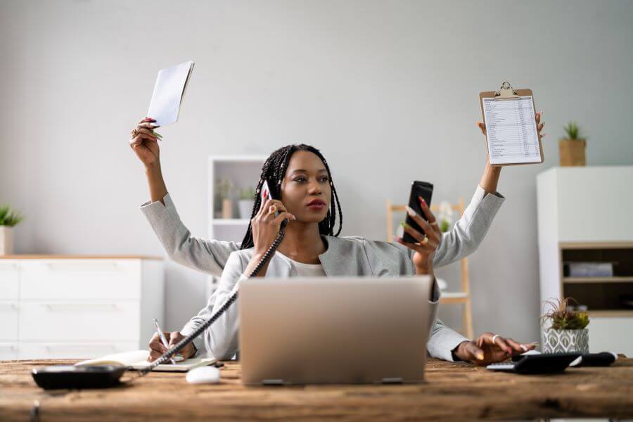 Scaling Too Fast or Too Slow: Finding the Right Pace for Small Business Growth 1 busy businesswomen multi tasking