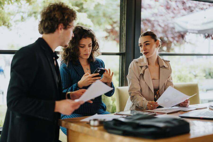 Scaling Too Fast or Too Slow: Finding the Right Pace for Small Business Growth 2 small business team meeting
