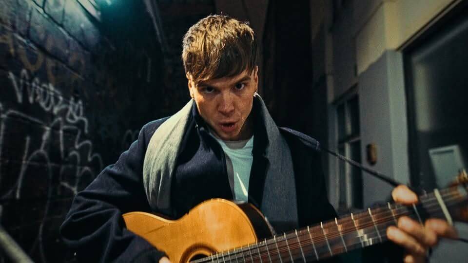 Welsh-born musician Ren Gill performing live, known for his viral hit Hi Ren and independent rise to UK chart success